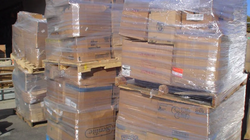 Pallets of wrapped supplies stacked ready for distribution.